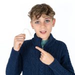 boy taking invisalign service